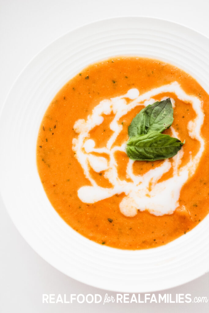 This plant based tomato basil soup is creamy and packed with vegetables. It is delicious and something your family will ask you to make on repeat!